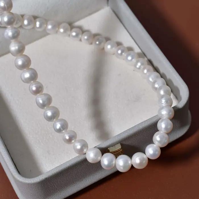 Perles en vrac naturelles d'eau douce blanches nacrées filetées 5-6mm