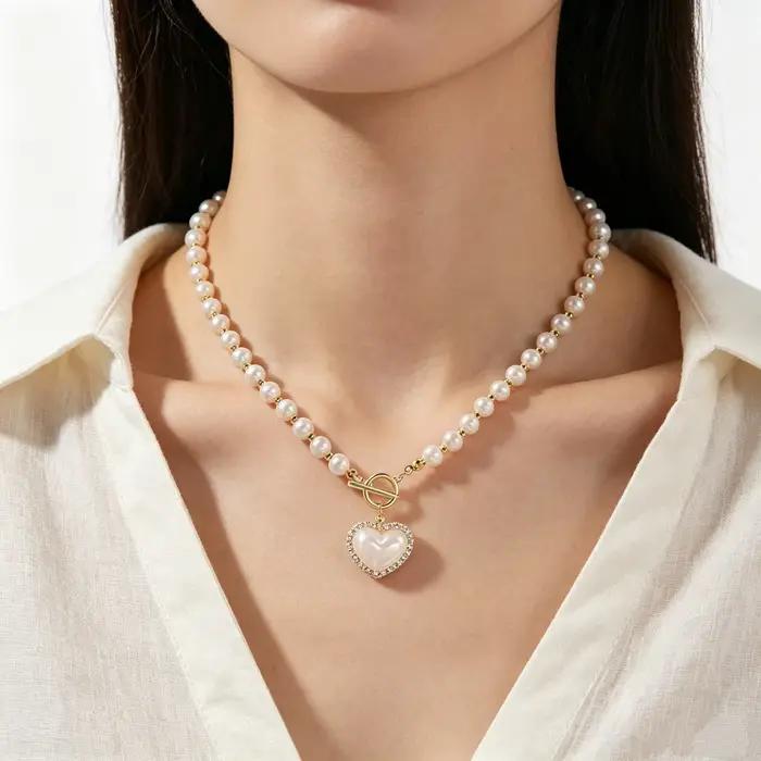Collier élégant en perles d'imitation pour femmes, chaîne de luxe en perles d'imitation, chaîne de clavicule, bijoux à breloques