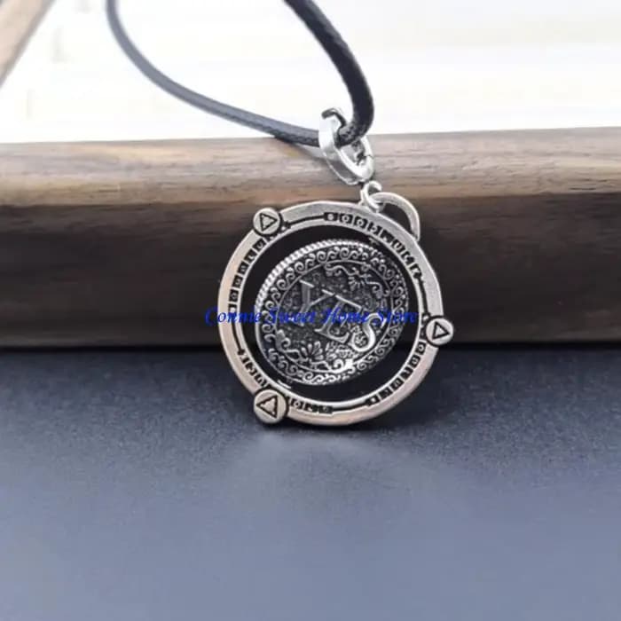 LXAF – collier avec pendentif en forme pièce monnaie rotative