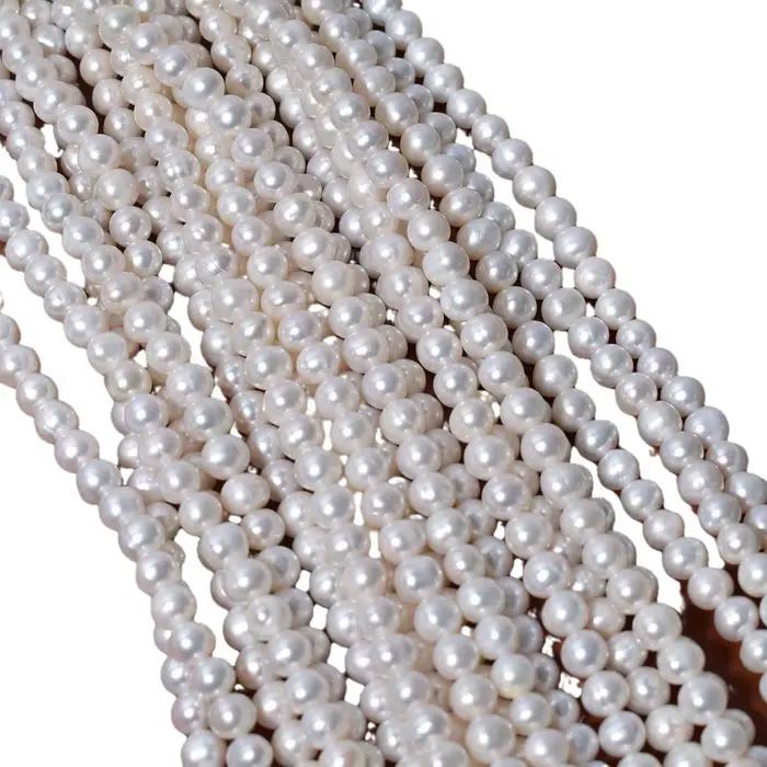 Perles en vrac naturelles d'eau douce blanches nacrées filetées 5-6mm