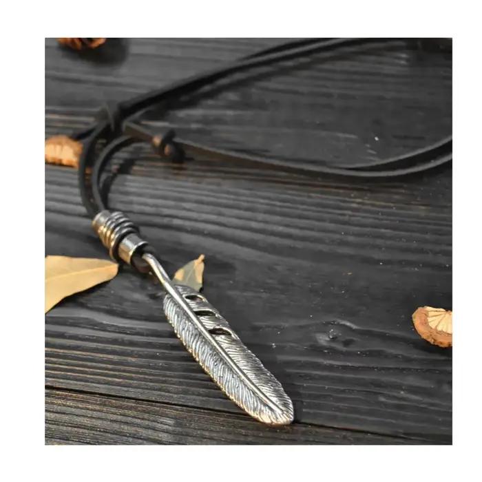 Collier pendentif ailes d'ange artistique Vintage, collier en alliage de corde en cuir de vache à la mode pour hommes et femmes