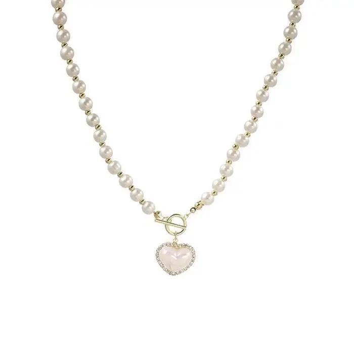 Collier élégant en perles d'imitation pour femmes, chaîne de luxe en perles d'imitation, chaîne de clavicule, bijoux à breloques