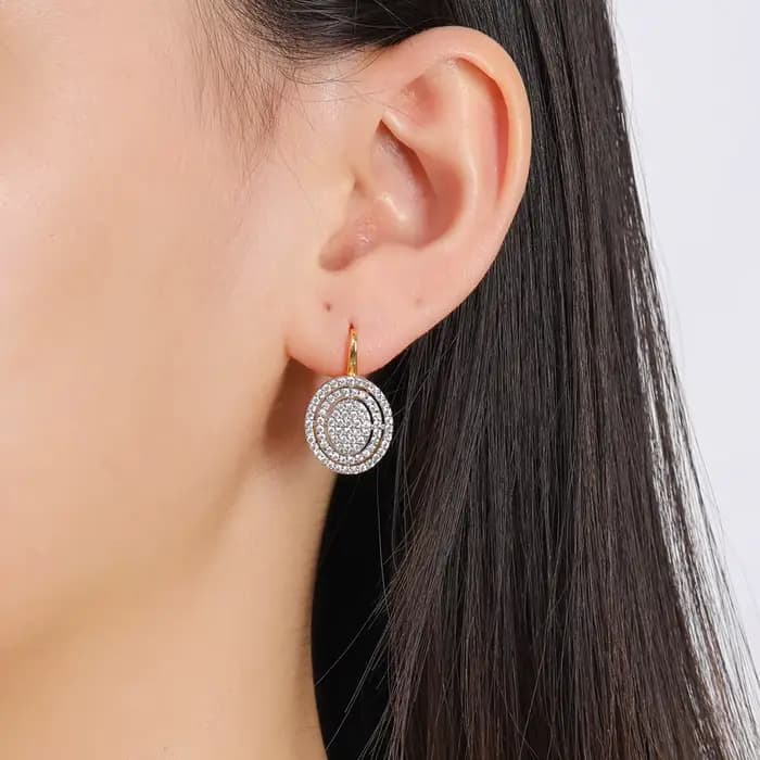 Ensemble de boucles d'oreilles et bague ovales incrustées de zircone