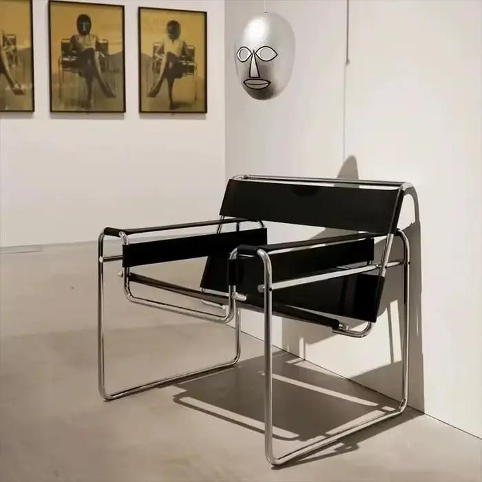 Fauteuil à bascule Bauhaus en acier tubulaire et cuir, style Mid-Century Modern, fauteuil lounge, siège d'appoint minimaliste emblématique
