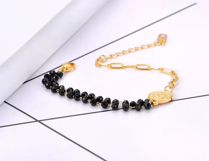 Bracelet à breloques vintage avec pièce de monnaie de la reine Elizabeth