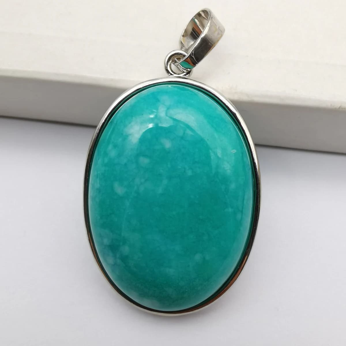 Pendentif ovale en pierres précieuses : Rhodonite, Œil de tigre, Cristal, Opale, Obsidienne, Labrado