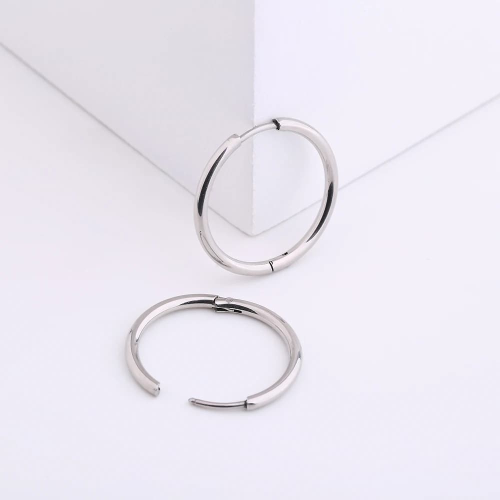 1 paire de boucles d'oreilles créoles pour hommes et femmes, bijoux de perçage en titane