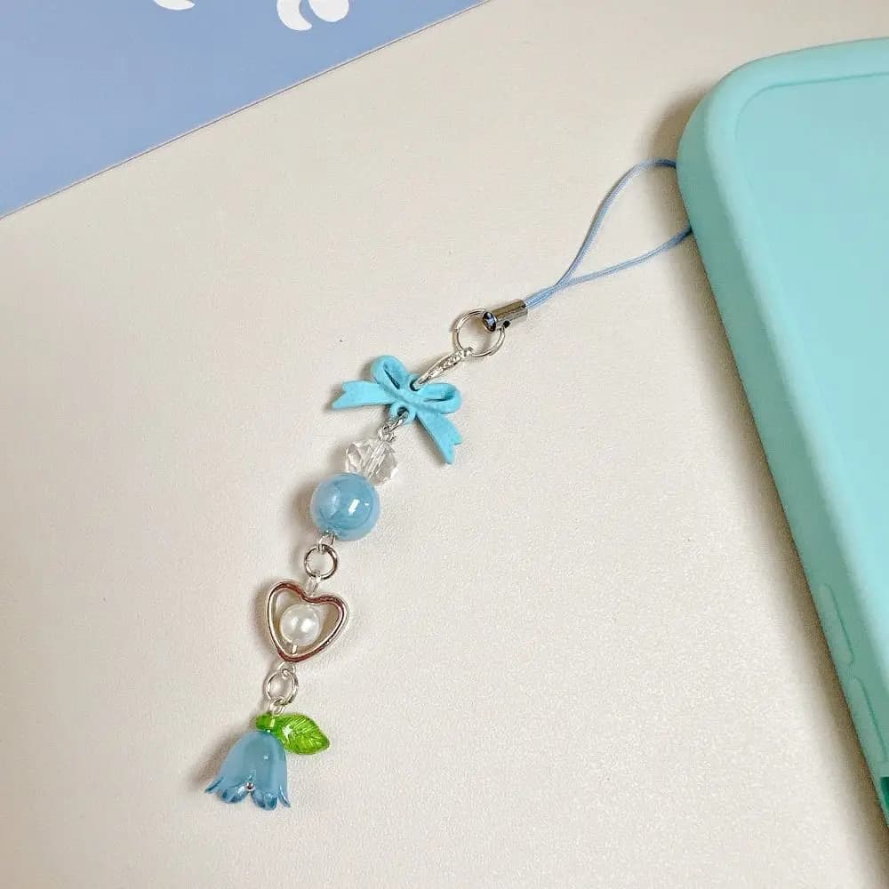 Chaîne de téléphone portable avec perles et nœud, motif Convallaria, bracelet de poignet, cordon de 