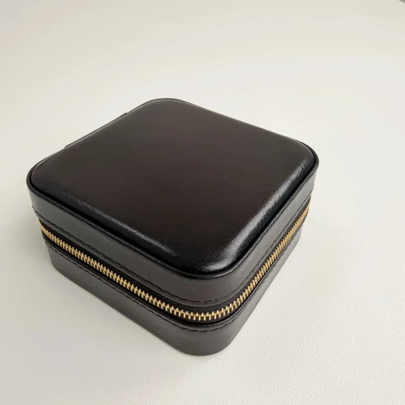Boîte à bijoux pour collier portable multi-compartiments haut de gamme en cuir de vache ciré à l'hui