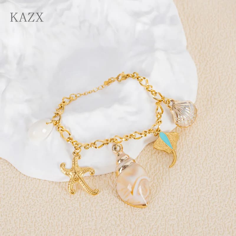 Bracelet Bohème de Plage en Acier Inoxydable avec Coquillages, Étoiles de Mer et Raies – Bijou Tenda