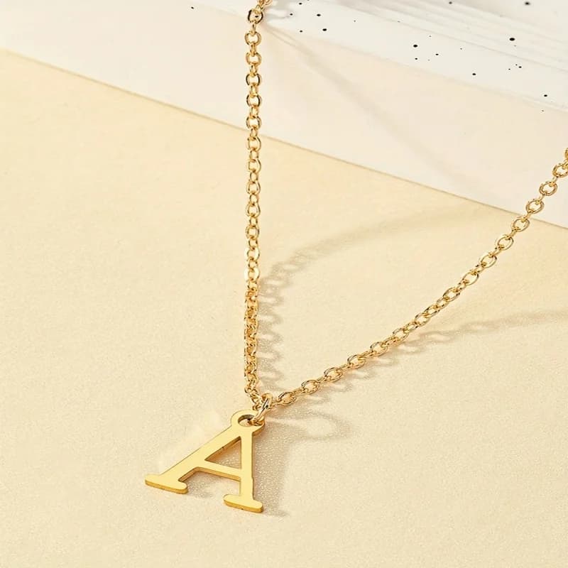 Collier tendance avec pendentif alphabet ajouré pour femme - 26 lettres, chaîne en acier inoxydable doré, bijou personnalisé, cadeau de mode