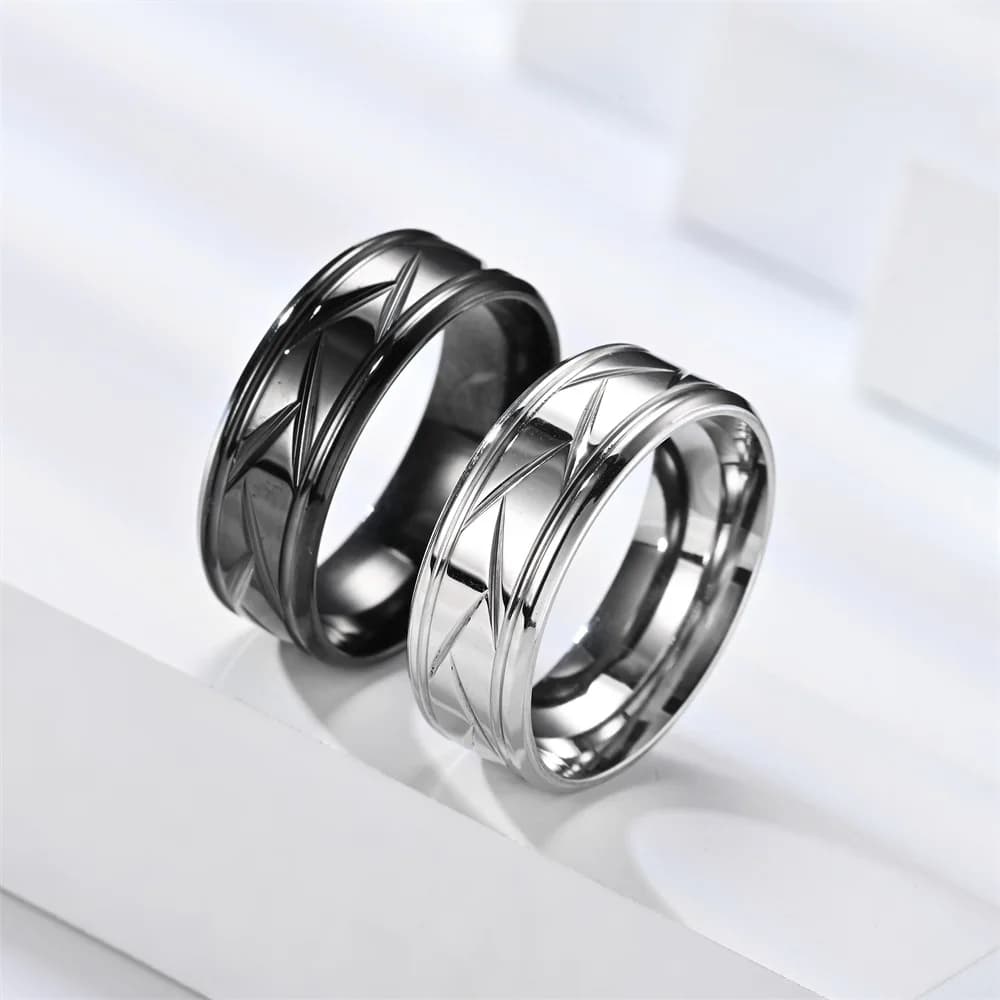 Bague en acier inoxydable noir de couleur argentée pour hommes et femmes