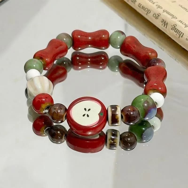 Bracelet en céramique de perles d'os de fruits de pomme fait à la main, extensible, bijoux ethniques Boho, cadeau Unique