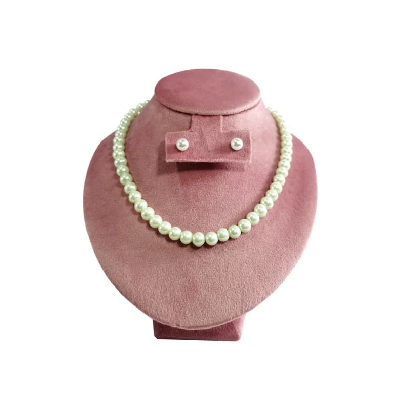 Magasin de bijoux rose velours Portrait cou bijoux présentoir pendentif anneau plateau comptoir vitrine de détail organisateur