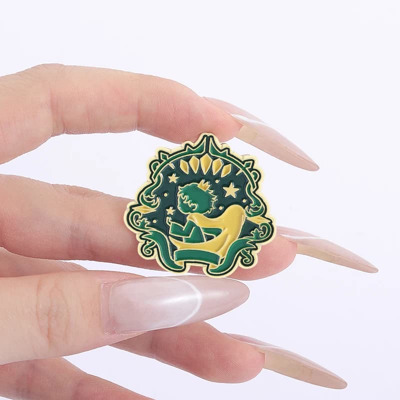 Broches en émail Prince et Rose