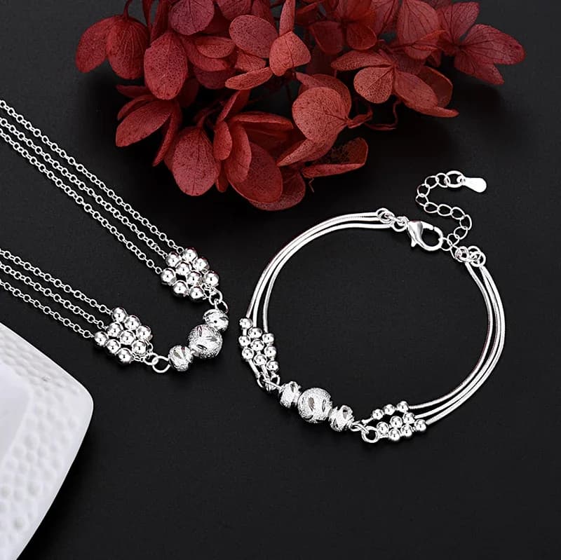 Ensemble de bijoux collier et bracelet en argent sterling 925 avec perles porte-bonheur pour femme, idéal pour les fêtes et mariages, par un créateur de mode