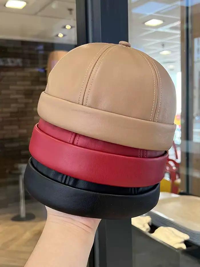 Chapeau de propriétaire en cuir vintage de printemps et d'été avec hip hop réglable et chapeau en peau de melon sans bords adapté aux hommes et aux femmes