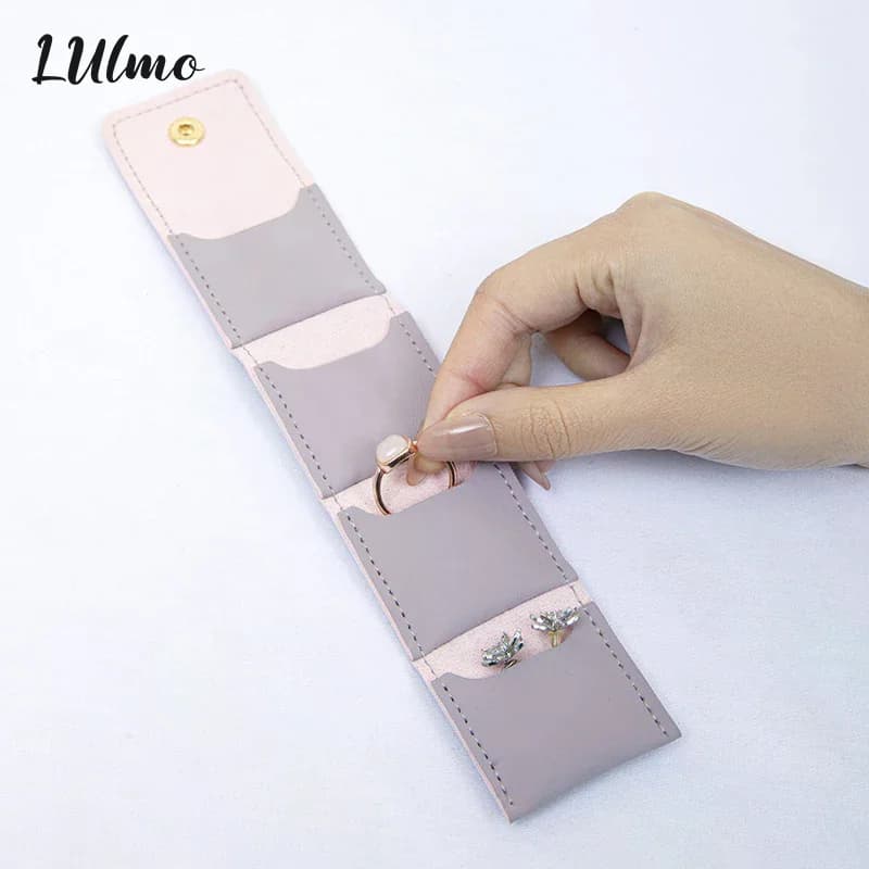 Pochette de rangement de bijoux pliable avec plusieurs compartiments pour bagues, colliers, boucles d'oreilles, Mini sac en rouleau de bijoux de voyage avec boucle