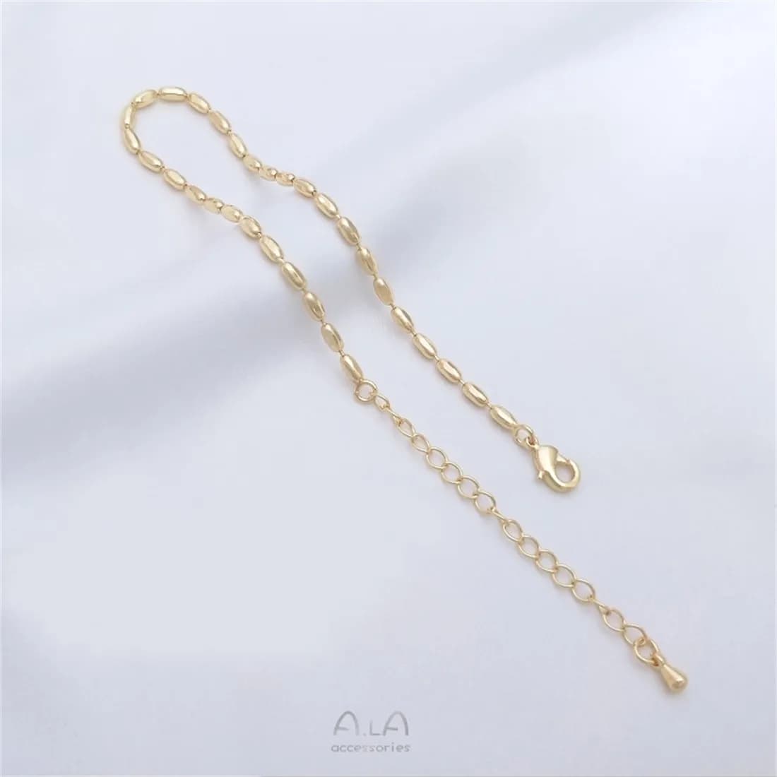 Collier de perles de riz pour documents en or 14 carats