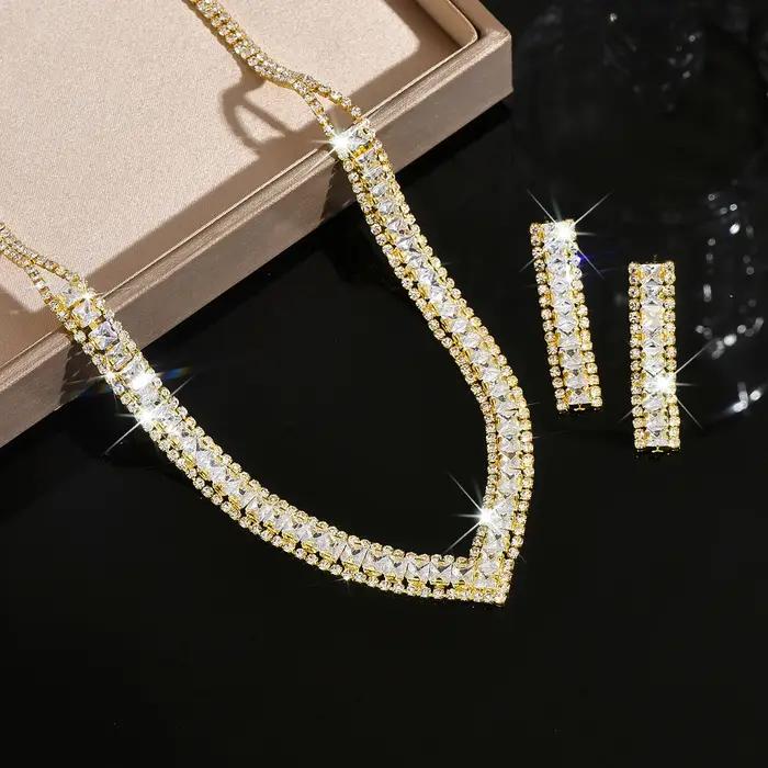 Nouvel ensemble collier et boucles d'oreilles de mariée ultra-brillant en forme de V