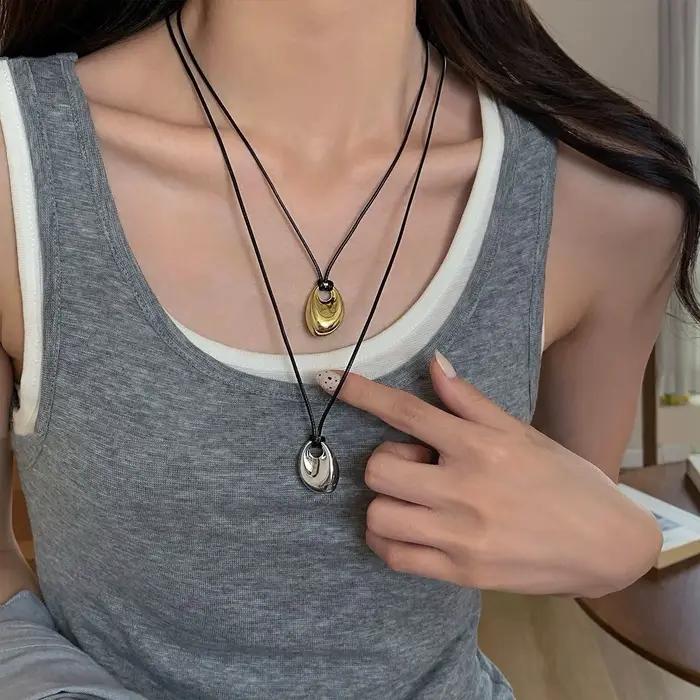 Collier réglable en cuir PU avec pendentif haricot irrégulier