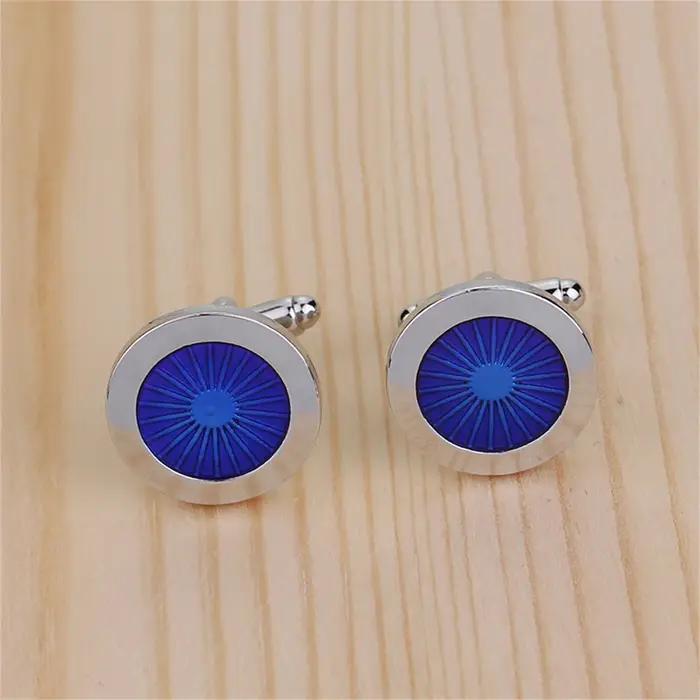 Boutons de manchette circulaires bleus