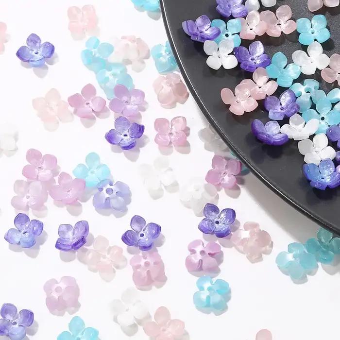 Perles d'espacement en forme de fleur à quatre pétales pour bijoux