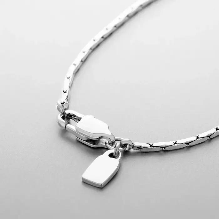 Collier en acier inoxydable ELANDIS avec finition plaquée or pour homme, chaîne simple, design géométrique, adapté aux différentes occasions
