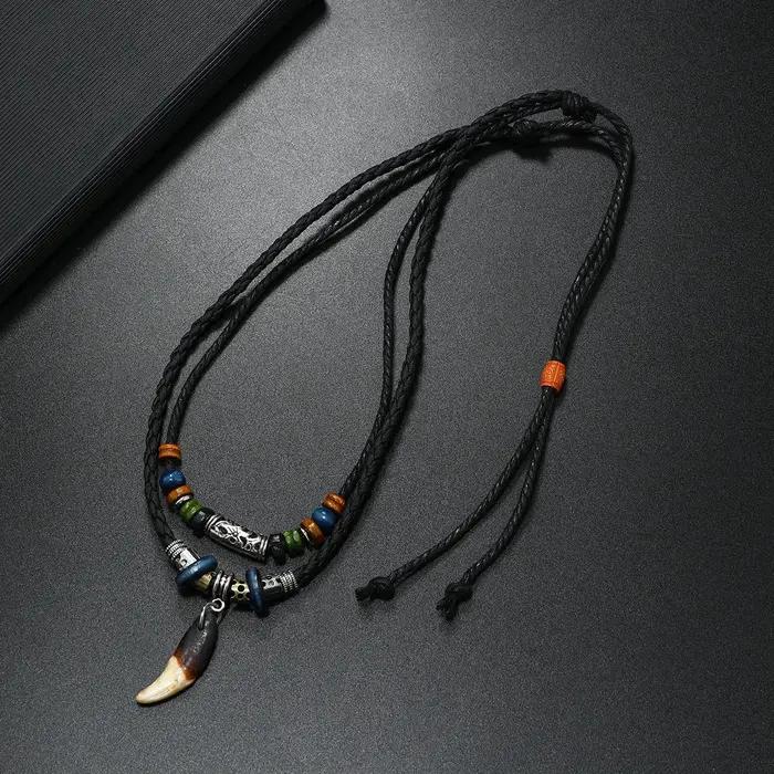 Collier multicouche en dents de chien