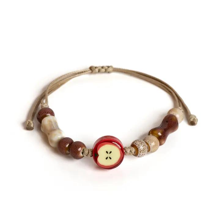 Bracelet en céramique de pomme fait à la main