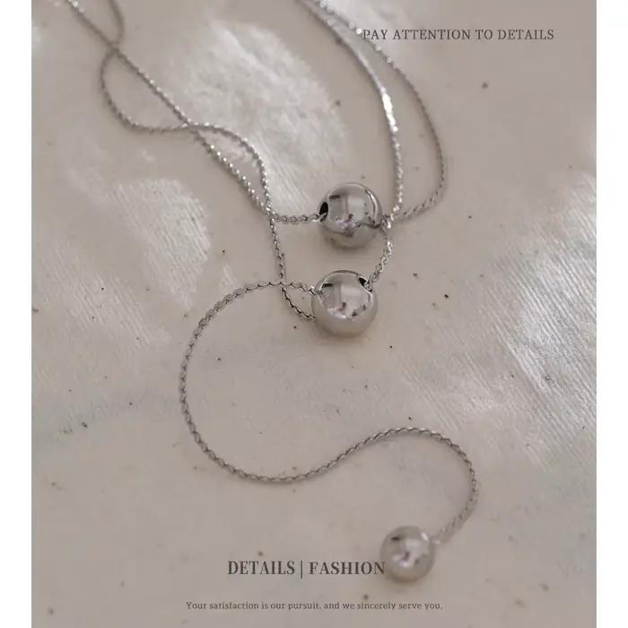 Collier en acier inoxydable avec pendentif de perles rondes, design géométrique en or véritable, cadeau élégant pour femmes, idéal pour les soirées et événements sociaux