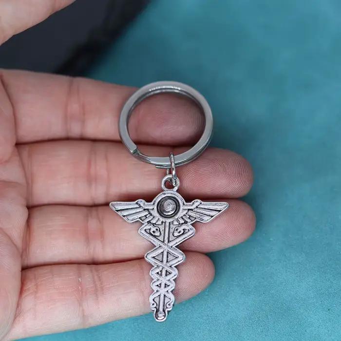 Porte-clés symbole de médecine grec