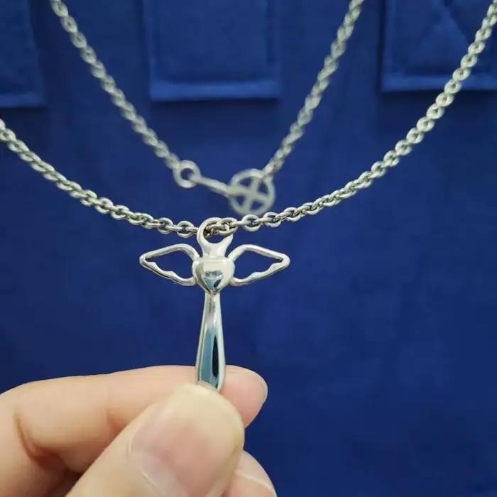 Collier pendentif ange panoramique en titane véritable