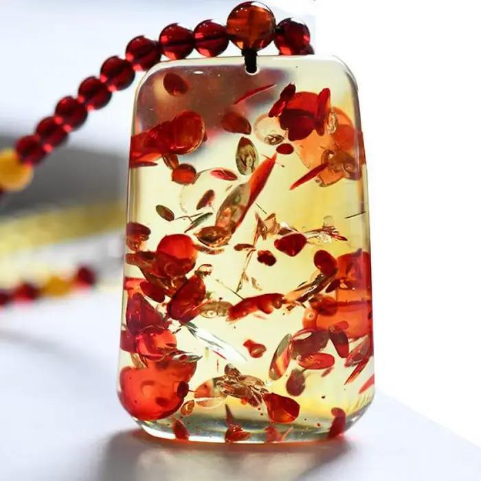 Collier avec pendentif en ambre à fleurs fines pour homme et femme