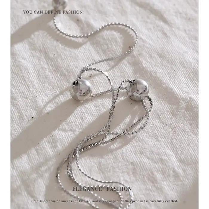 Collier en acier inoxydable avec pendentif de perles rondes, design géométrique en or véritable, cadeau élégant pour femmes, idéal pour les soirées et événements sociaux