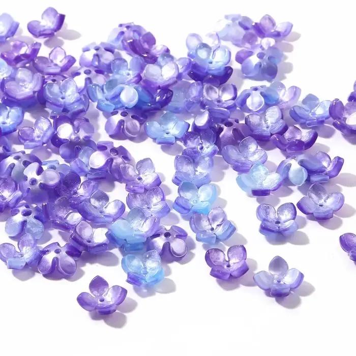 Perles d'espacement en forme de fleur à quatre pétales pour bijoux