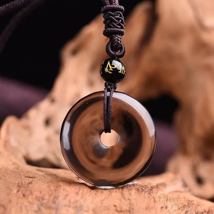 Collier pendentif rond en obsidienne pour la Protection