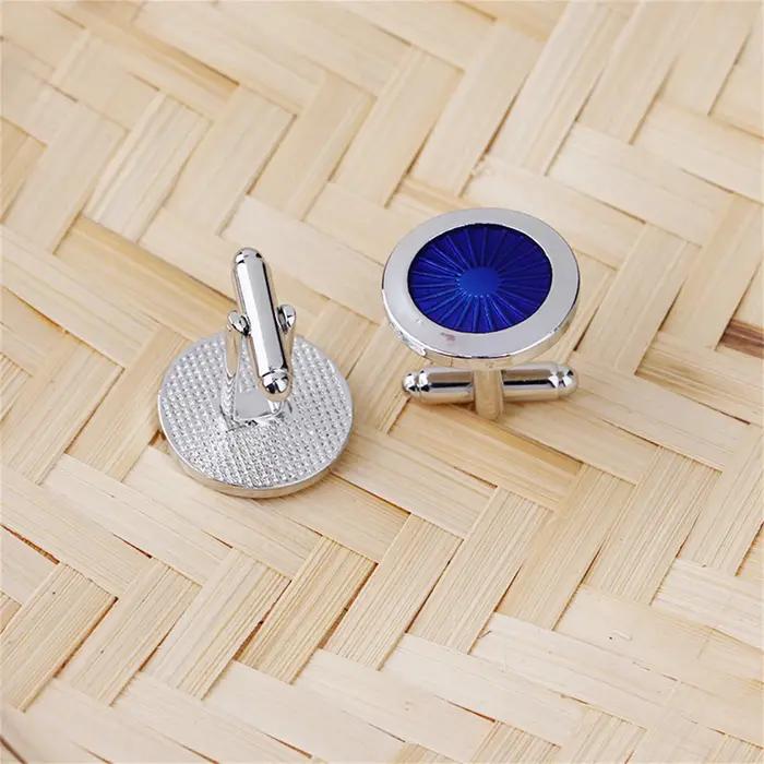Boutons de manchette circulaires bleus
