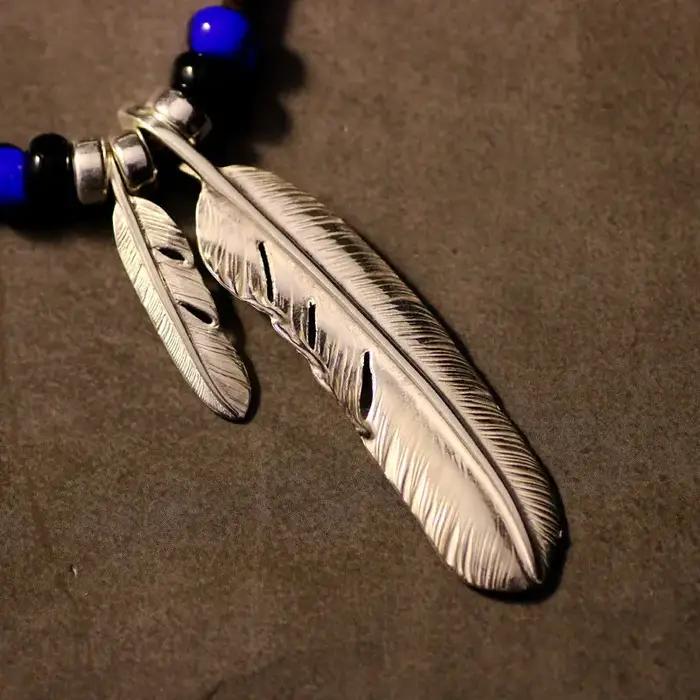 Collier en corde de cuir avec pendentif Turquoise en plumes rétro indiennes