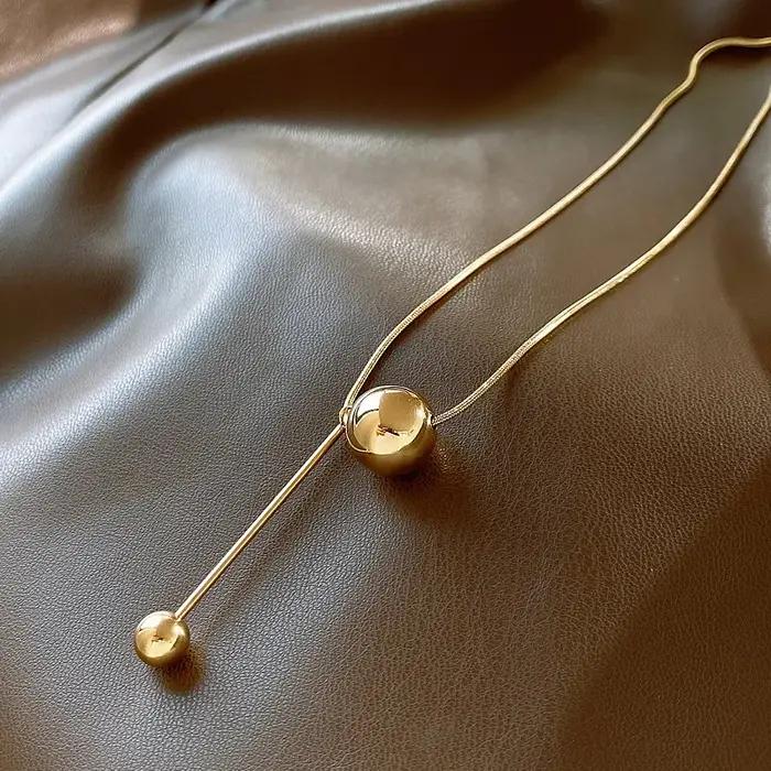 Pendentif boule dorée Simple