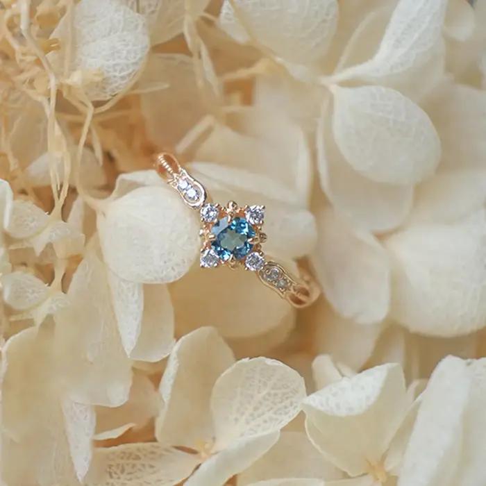 Bague romantique vintage en saphir bleu, fleur, ajustable pour mariage et occasions spéciales