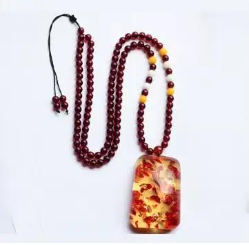 Collier avec pendentif en ambre à fleurs fines pour homme et femme