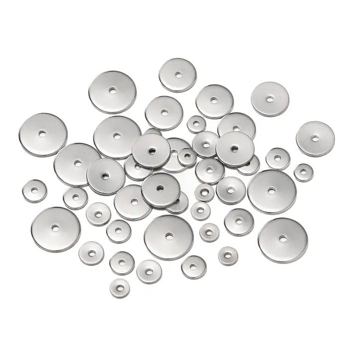 Perles d'espacement rondes et plates de couleur or